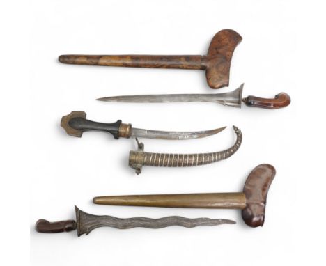 Malayan Kris with hardwood grip and scabbard, another and a Middle Eastern jambiya with decorative brass and silvered metal s