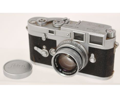 Leica: A Leica M3 camera body, serial number 857435, complete with Ernst Leitz GmbH Wetzlar Summicron f=5cm 1:2 No. 1365425 l