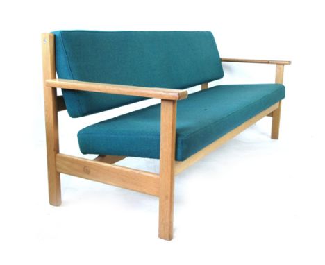 Hans Wegner for Getama, an oak and upholstered three seater sofa on square straight legs   CONDITION REPORT:  Structurally so