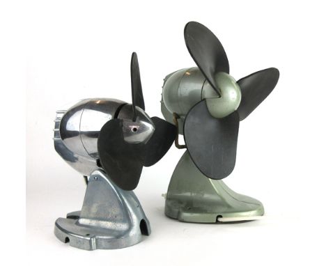 A group of three 1960's desk fans with metal bases of aeronautical form and rubber blades   CONDITION REPORT:  Sold as a coll
