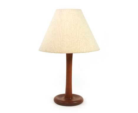 A Dyrlund teak turned table lamp with a spun fabric shade, h. 78 cm   CONDITION REPORT:  Working order unknown, plug will req