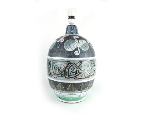 A Swedish pottery table lamp base decorated with stylised figures and incised bands by Ingmans Keramik, h. 42 cm, together wi