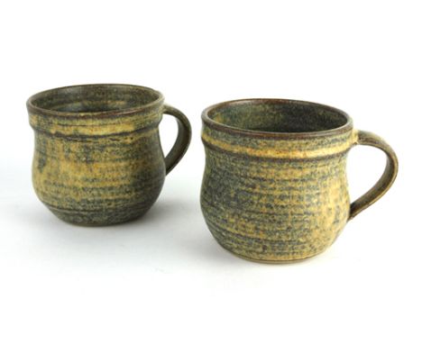 Alan Brough (b.1924, ex-Leach Pottery), a pair of stoneware mugs, signed to bases, h. 8 cm each