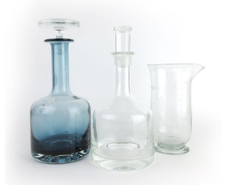 Ronald Stennett Wilson for Whitefriars, a 1969 cased glass decanter in pale orange with stopper, h. 26 cm, together with two 