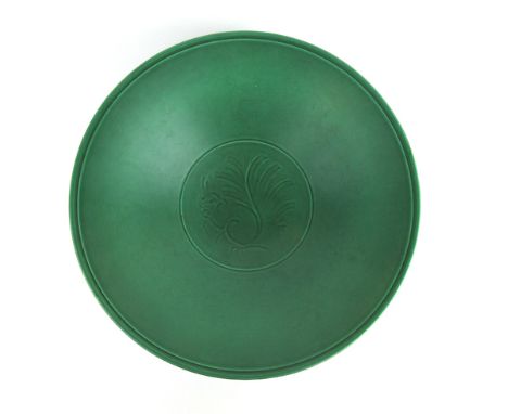 A Danish ceramic bowl decorated in a green glaze with a squirrel, marked to the underside 'Denmark 1807 1583', d. 29 cm