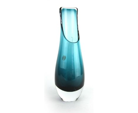 Per Lutken for Holmegaard, a blue cased glass spill vase with a sloped rim, bearing partial paper label, h. 23 cm