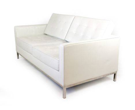 Amended description; A white leather button upholstered two seater sofa on a chromed frame attributed Florence Knoll    CONDI