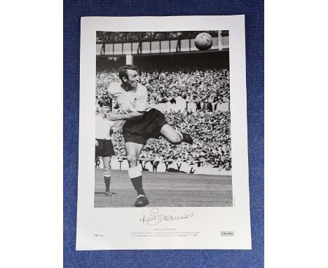 Jimmy Greaves signed 16 x 23 black and white limited edition photo. Photo shows Greaves heading Tottenham's first goal in the