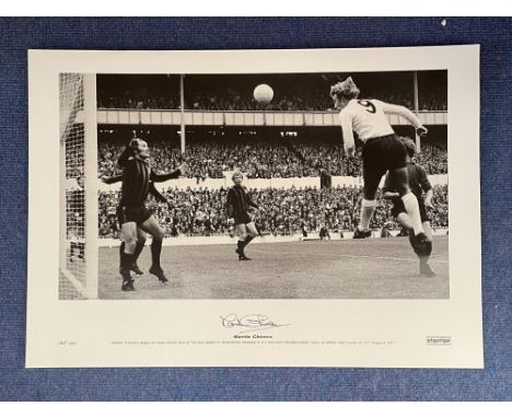 Martin Chivers signed 16 x 23 Artist Proof black and white photo. Photo shows Chivers leaping to head home one of his two goa