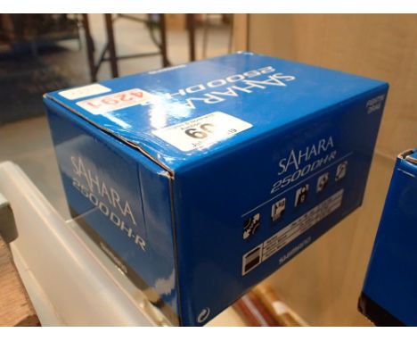 Shimano sahara 2500DH-R reel as new in box with Shimano line and spare spool