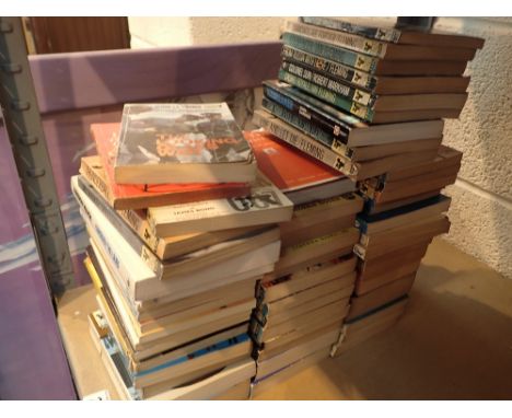 Shelf of paperback books