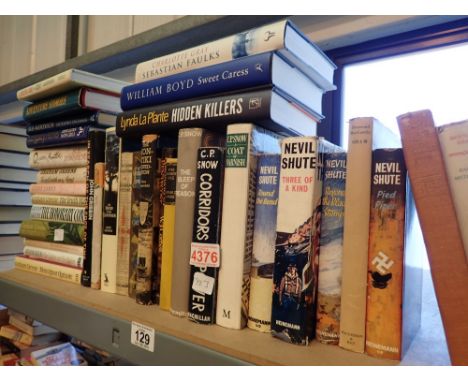 Shelf of non fiction hardback books