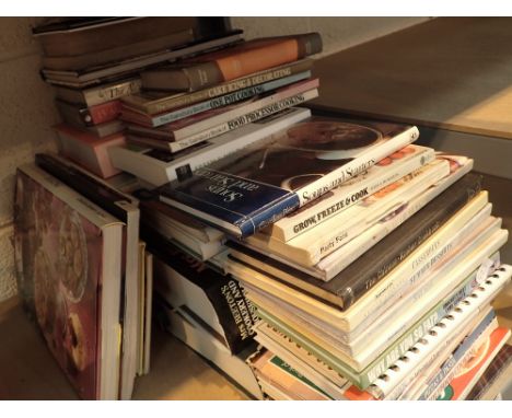Shelf of paperback and hardback cookery books