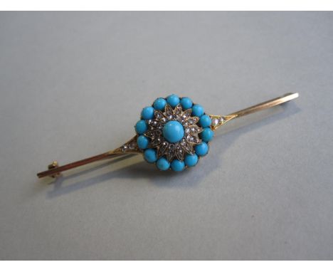 A Victorian turquoise and diamond bar brooch, set with a circular flower motif with a central and an outer ring of round cabo