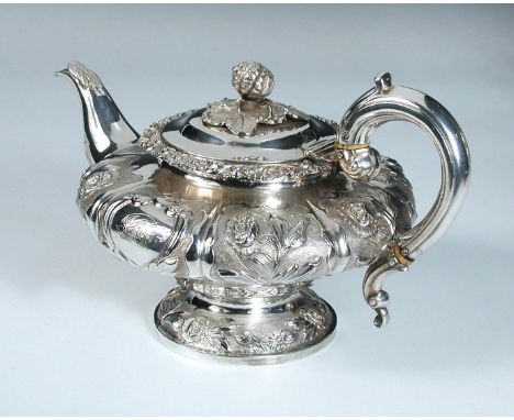 A Victorian silver teapot, by Richard Pearce & George Burrows, London 1837, of compressed circular lobed form, each panel cha