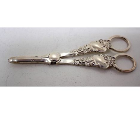 A pair of Victorian silver grape shears, by George Jackson &amp; David Fullerton, London 1899, the stems cast with floral scr