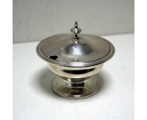 A William IV silver mustard with lift off lid, by James Charles Edington, London 1834, of compressed circular shape below a m