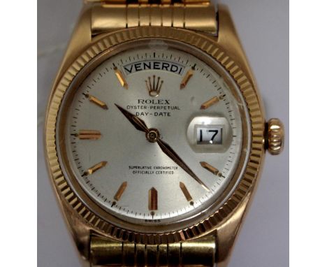 A gentleman's 18ct rose gold cased Rolex Oyster Perpetual Day Date Superlative Chronometer wrist watch, the silvered dial wit