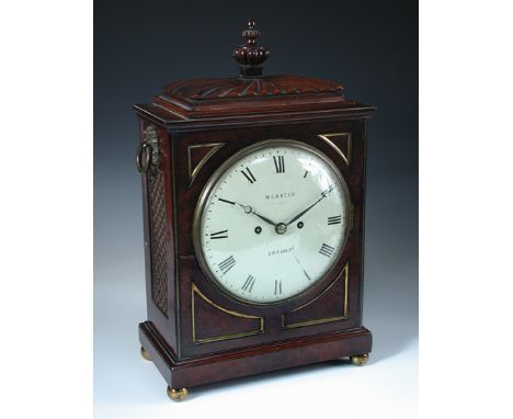 A Regency mahogany bracket clock, the gadrooned cornice above circular enamel dial marked 'Webster, Cornhill, London', with t