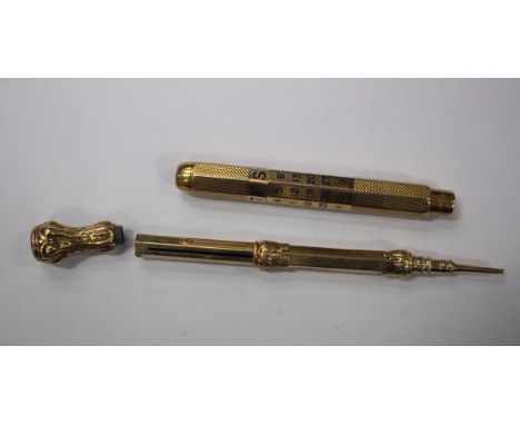 A 9ct gold calendar pencil, by Sampson Mordan & Co, the heptagonal engine turned body with rotating calendar to the centre, w
