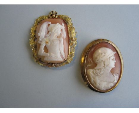 Two shell cameos depicting historical warriors, one in an 18ct gold mount, the first oval with a classical bust length youth 