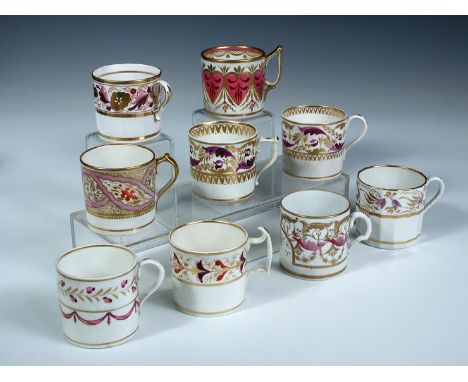 Sixteen early 19th century coffee cans decorated with similar colour palette of pinks, purples and gilt, including examples b