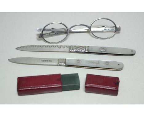 A pair of early 19th century silver frame spectacles, by George Unite, the oval glazed frames fitted with folding telescopic 