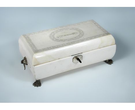 A 19th century Indian ivory box containing two miniature 'books' of playing cards, the rectangular hinged lid inscribed 'Mrs 