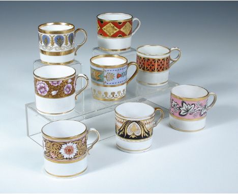 Eight Regency coffee cans, each with banded decoration and gilt highlights, including examples by Spode, Factory Z, Barr Worc