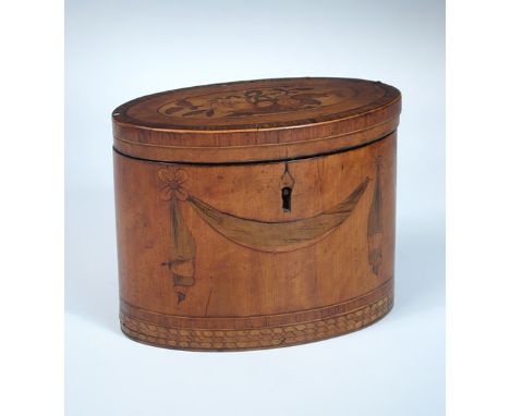 A late 18th century marquetried satin wood tea caddy, the oval top inlaid with a basket of fruit within rosewood cross bandin