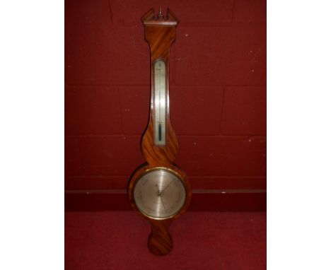 J.Kemp ,Wakefield, a mahogany wheel barometer, 19th century, the broken arch pediment above silvered dial and thermometer, 98