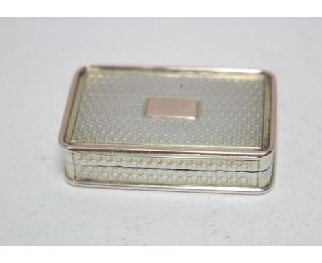 A George IV silver parcel gilt vinaigrette, by Nathaniel Mills, Birmingham 1829, rectangular with engine turned decoration, t