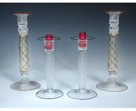 William Gudenrath (Born 1954), two pairs of glass candlesticks, the first pair with amber highlighting, the others with black