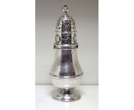 A Queen Anne silver sugar caster, by Charles Adam, London 1709, of plain baluster shape with moulded girdle, the decoratively