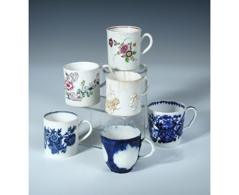 Two Bow coffee cans, another in blanc de Chine, a Caughley, a Worcester and another coffee can, the cylindrical sides of the 