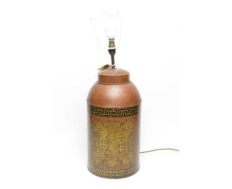 An early 20th Century Chinoiserie decorated table lamp, converted from a tin tea canister, decorated with Chinese symbols, 56