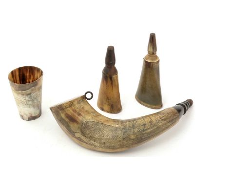 A buffalo horn powder flask, later decorated with whaling scene, 39cms wide; two further horn flasks; and a horn beaker, insc