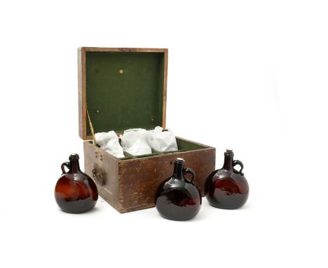 A 19th Century set of six decanter bottles, each in brown glass with loop handles, fitted with stoppers inscribed 'W' 'R' and