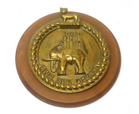 An Unofficial pattern ship's tampion, from the Light Cruiser H.M.S. Coventry, c.1916, cast in brass with profile elephant and