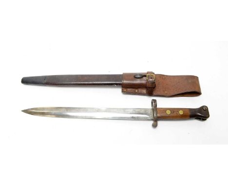 A British 1888 pattern MkI Lee Metford bayonet, type II, the 30cms double edged blade with wood mounted grip and leather and 