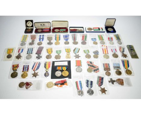 A collection of 20th Century medals, including: Queen Elizabeth II Imperial Service medal awarded to Ralph William Donald Cre