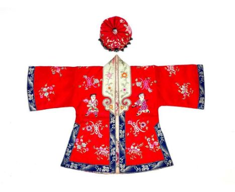 A late Qing Chinese Han child's robe and hat, of red silk, embroidered with auspicious symbols, the back of the robe depictin