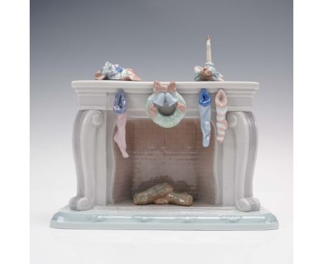 From the Night Before Christmas Collection by Lladro, this porcelain figurine titled Up the Chimney He Rose depicts a decorat
