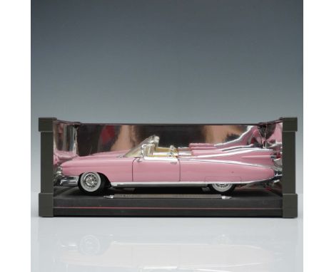 A highly detailed Eldorado model Cadillac in iconic pink exterior with white and beige interior. This enchanting collectible 