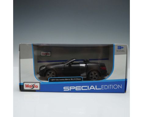 A special edition die cast model of the SLK class Mercedes. This black convertible replica comes in its original, unopened pa