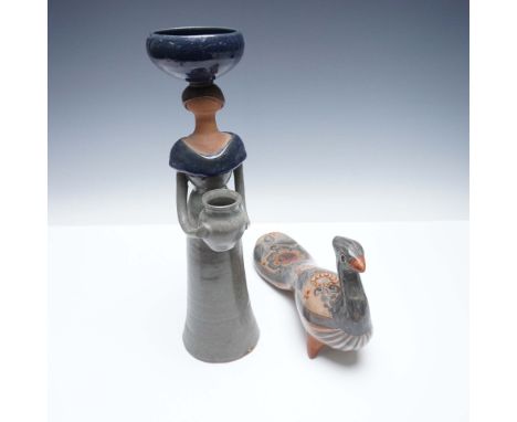 Pair of hand-crafted and signed ceramic sculptures from Mexico. The standing female figure, marked on the base "CASA DE CANTU