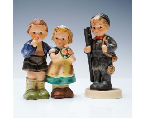Delightful pair of vintage Goebel Hummel figurines, both marked West Germany with the Goebel bee hallmark. This set includes 