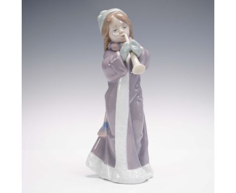 Celebrate the serene spirit of the holidays with Lladro's A Christmas Song (1006532), a beautifully crafted porcelain figurin