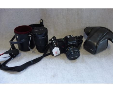 A PENTAX A3 CAMERA IN CASE, and a Pentax-A lens in case