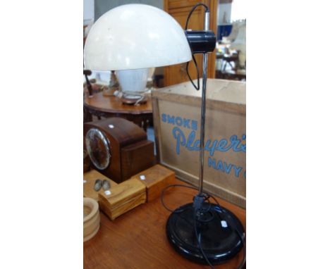 A FRENCH RETRO BLACK AND WHITE PLASTIC ADJUSTABLE TABLE LAMP